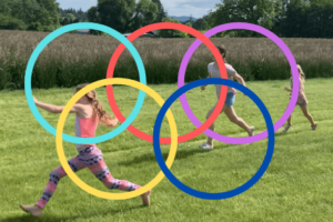 kids running a race in family olympics